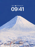 Serenity Peak Wallpaper with Snow-Covered Village