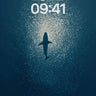 Abyssal Solitude Wallpaper with Shimmering School — digital wallpaper for iPhone, iPad and Mac