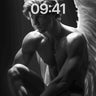 Shadowed Seraph Wallpaper with Feathered Light wallpaper for iPhone, iPad & Mac
