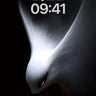 Silent Feather Wallpaper with Ethereal Light wallpaper for iPhone, iPad & Mac
