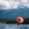 Serenity in Blue Fields Wallpaper with Red Umbrella wallpaper for iPhone, iPad & Mac