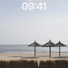 Serenity Sand Dune Wallpaper with Thatched Canopies wallpaper for iPhone, iPad & Mac