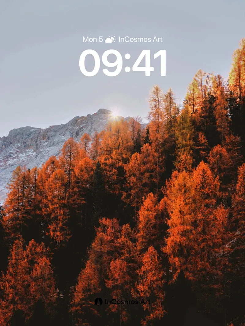 Autumn Ember Wallpaper with Sunlit Peaks