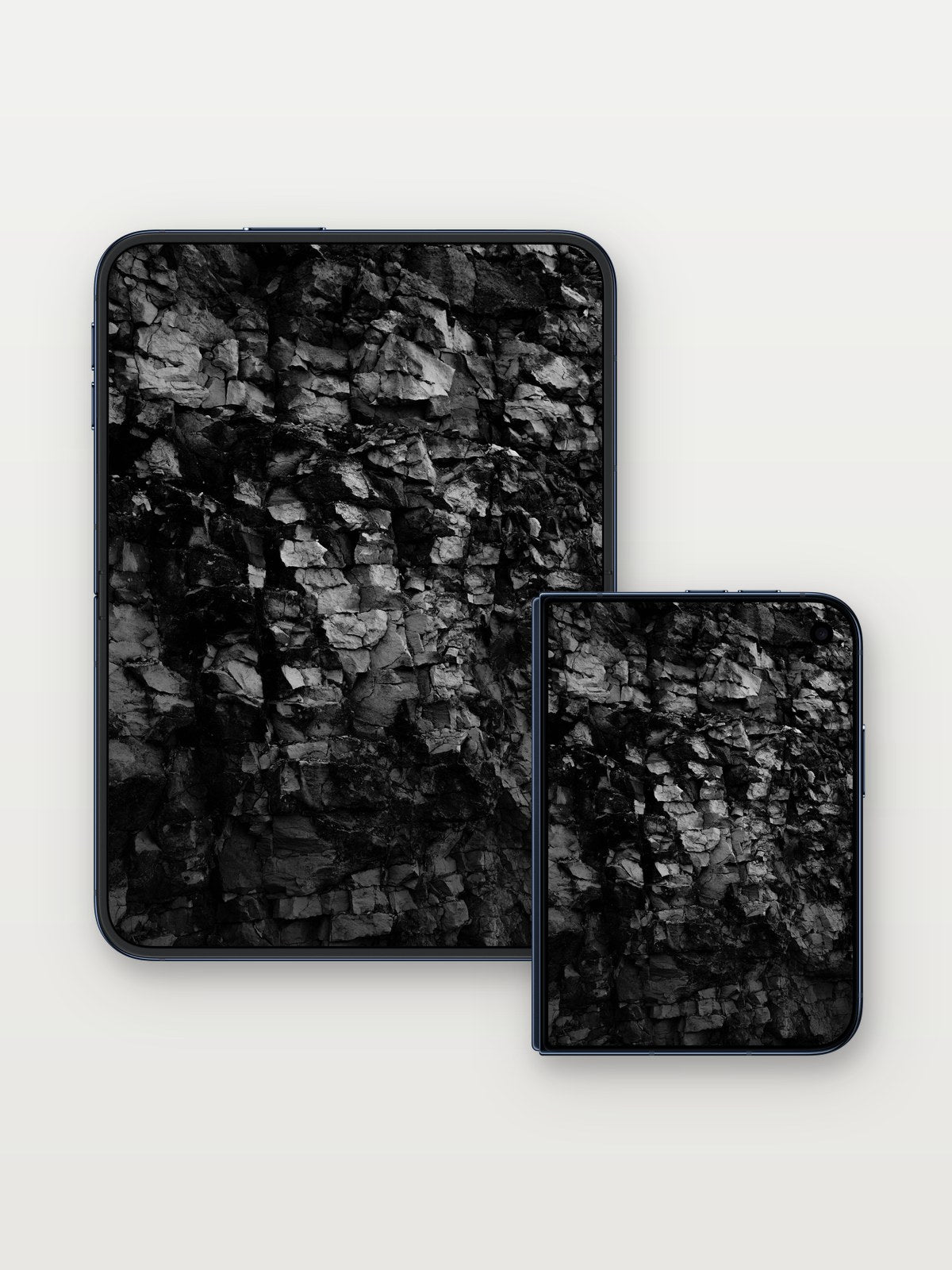 Shadowed Stone Wallpaper with Cracked Depths on iPhone Duo, open and closed