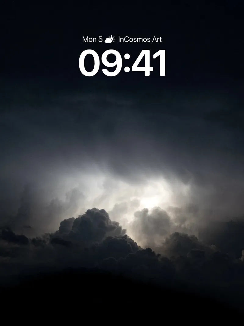 Shadowed Horizon Wallpaper with Moonlit Clouds