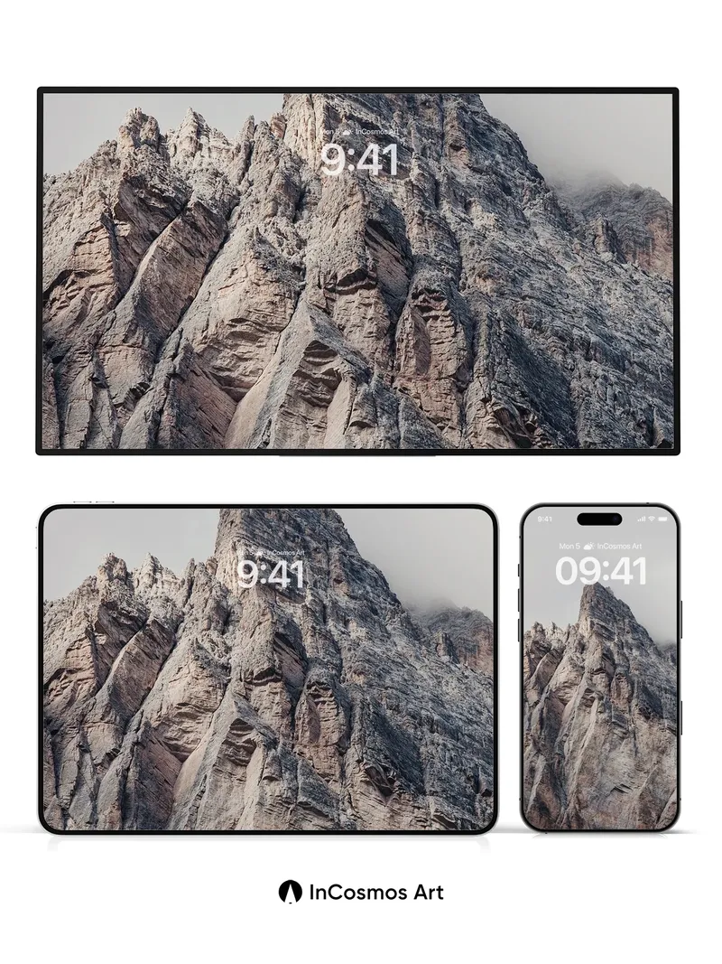 Stone Whisper Wallpaper with Cloud-Capped Spire