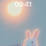 Luminous Hare Wallpaper with Celestial Glow wallpaper for iPhone, iPad & Mac
