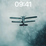 Cloud-Drift Biplane Wallpaper with Midnight Skies wallpaper for iPhone, iPad & Mac