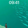 Serenity Ocean Wallpaper with Floating Fish Trail wallpaper for iPhone, iPad & Mac