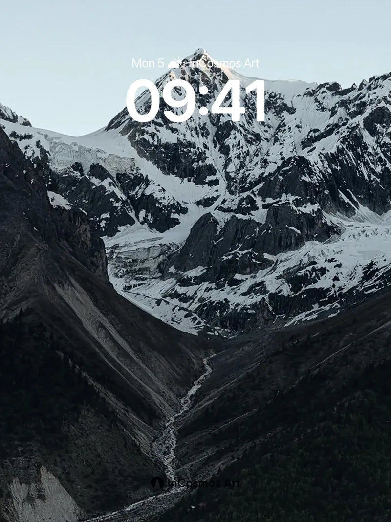 Silent Summit Wallpaper with Frost-etched Peaks