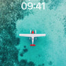 Serene Skyline Wallpaper with Floating Plane wallpaper for iPhone, iPad & Mac