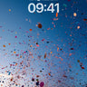 Cosmic Confetti Wallpaper with Sunset Glow wallpaper for iPhone, iPad & Mac