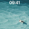 Serene Ocean Drift Wallpaper with Lone Boat wallpaper for iPhone, iPad & Mac
