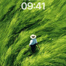 Whispering Green Wallpaper with Solitary Walker wallpaper for iPhone, iPad & Mac