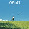 Whispering Grass Wallpaper with Floating Hat wallpaper for iPhone, iPad & Mac